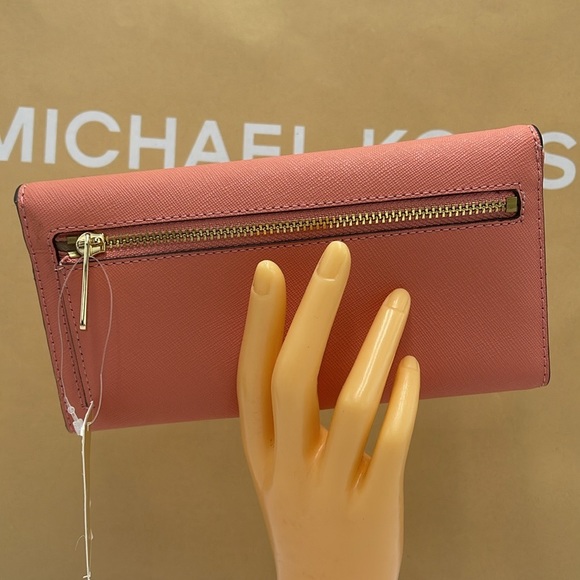 MICHAEL KORS JET SET TRAVEL LARGE TRIFOLD WALLET SHERBERT COLOR
NWT - Picture 5 of 16